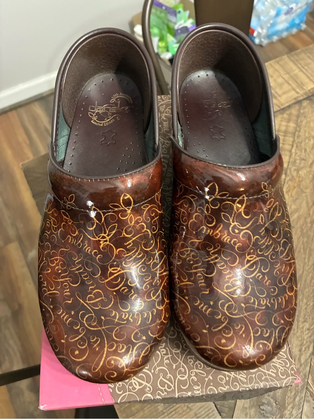 Dansko Brown Leather Clogs with Gold Script Detailing